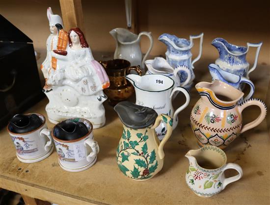 19thC flat-back Staffordshire group. Circa 1880 & 12 19thC pottery jugs etc(-)